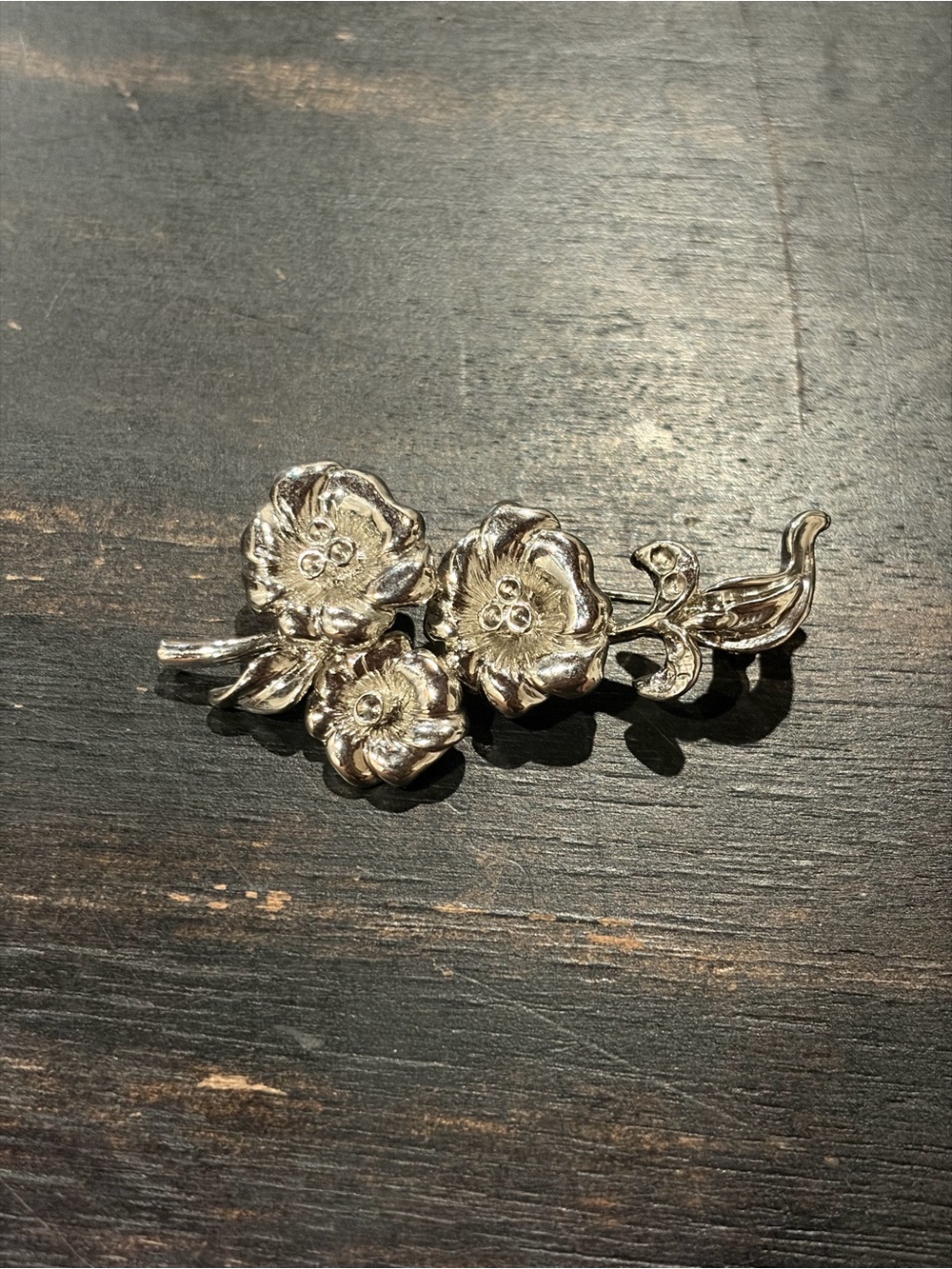 Silver flower brooch